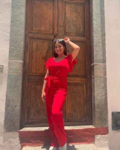 Kat Rigoni in red dress